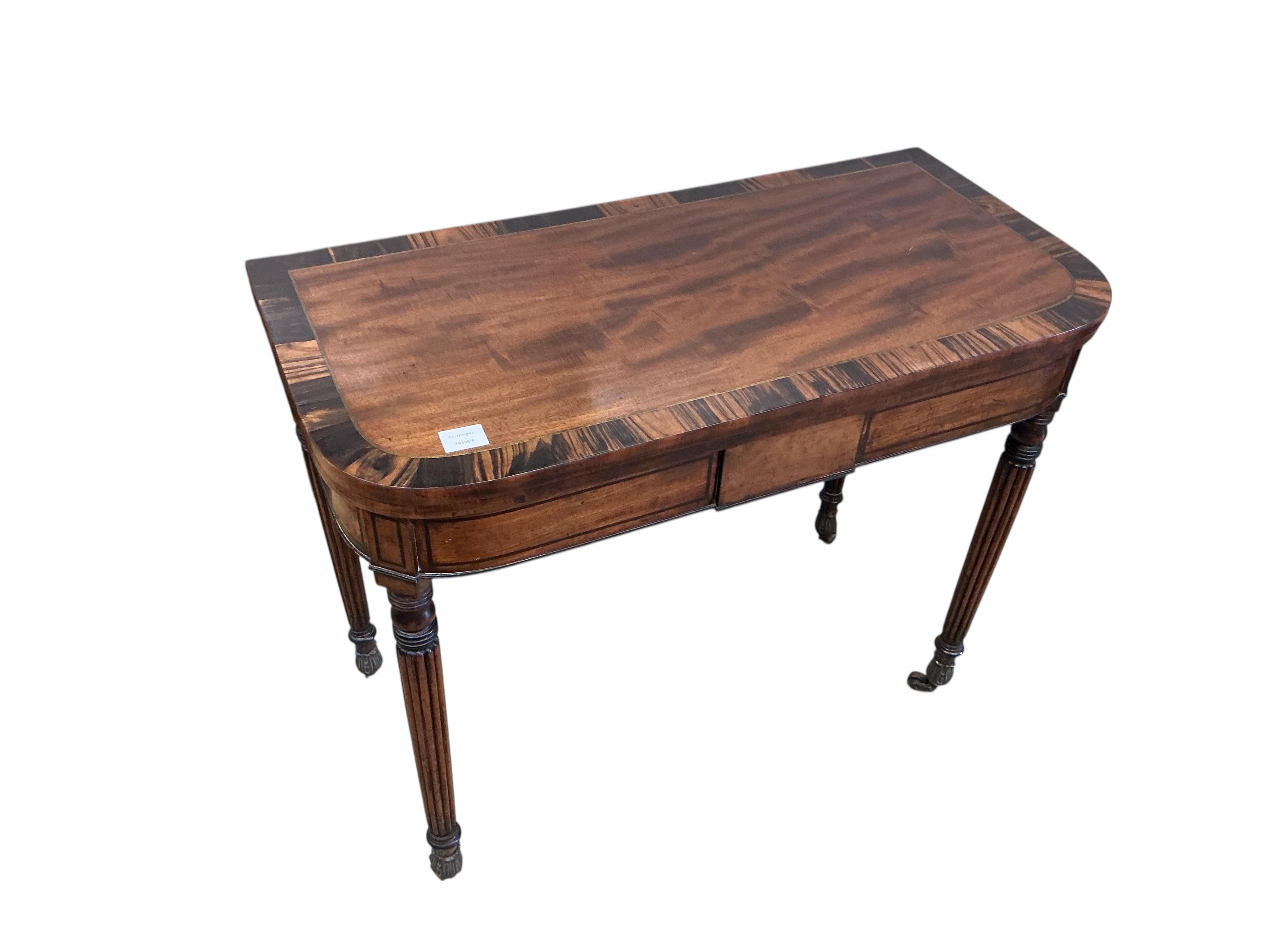 A Regency brass inlaid coromandel banded mahogany folding card table, width 91cm, depth 46cm, height 74cm